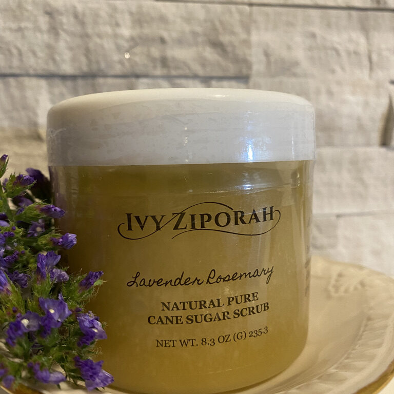 A jar of natural face mask sitting on top of a plate.